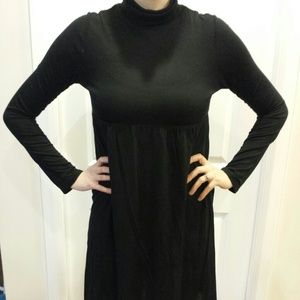 Velvet Torch black turtle neck.