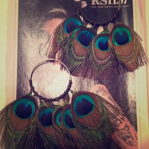 Large hoop peacock feather earrings