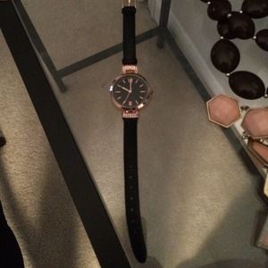 Rose gold and black watch