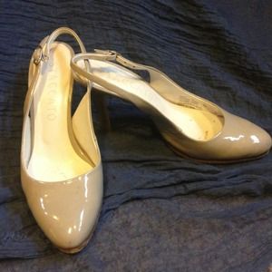 Light gray/tan colored sling backs