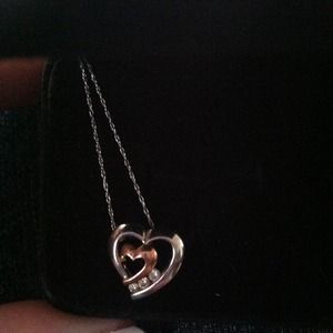 10 karat white cold with 3 diamond necklace