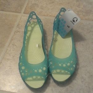 SOLD off site. Crocs, aqua / celery NWT