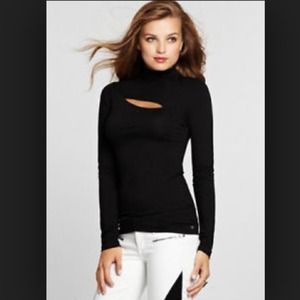 Black mock neck turtle neck. Guess