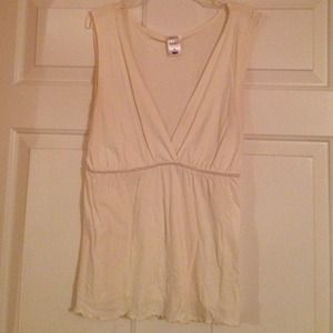 Cream colored deep plunge top