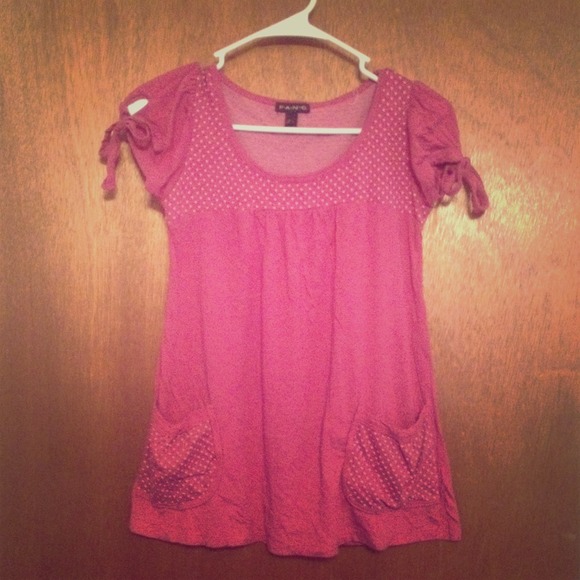 Pink and white polka dot baby doll shirt.