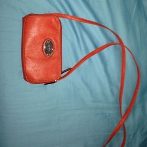 A orange Cross body purse