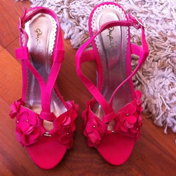 Pink wedge sandals.