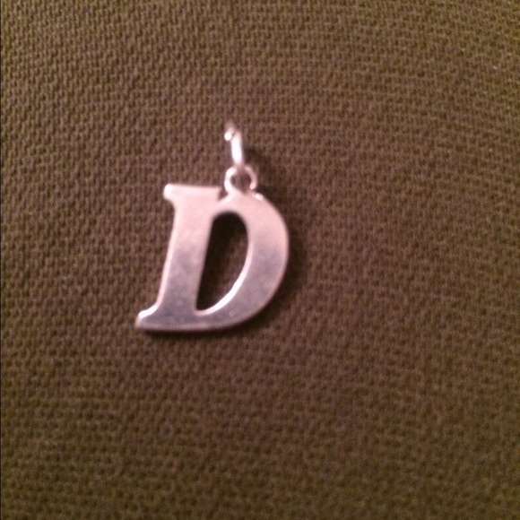 "D" initial charm