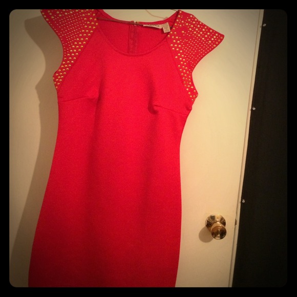 Red with Gold Studs on shoulders.