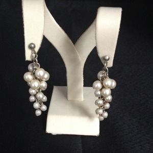 Pair of cascading faux pearl earrings.