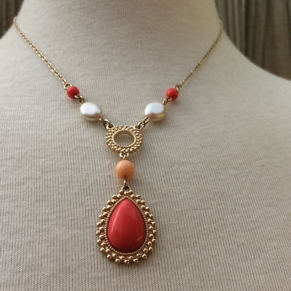 Adorable coral-colored statement necklace!