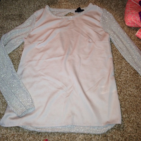 Silver cut out back shirt.(: