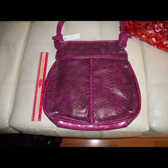 Purple snake like material hand bag trade 35