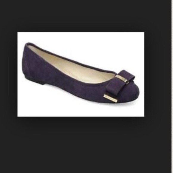 MK purple suede flats with gold detail.