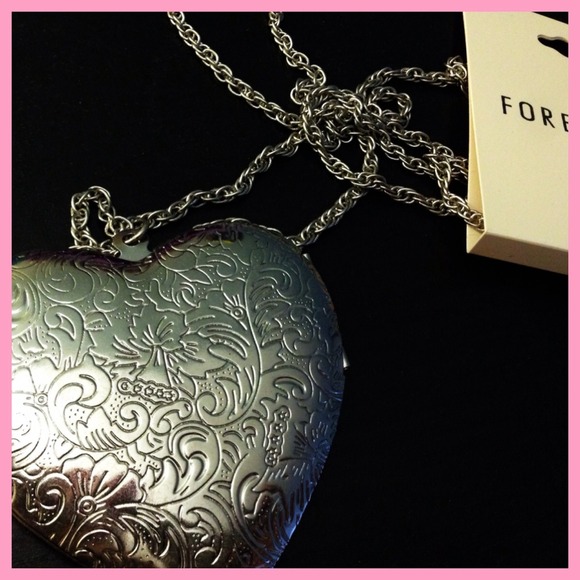 Silver heart locket necklace