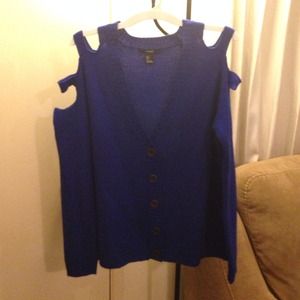 Blue knit sweater with shoulder cut outs