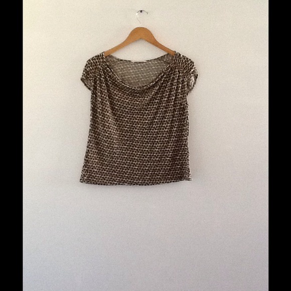 Green shirt with small white designs