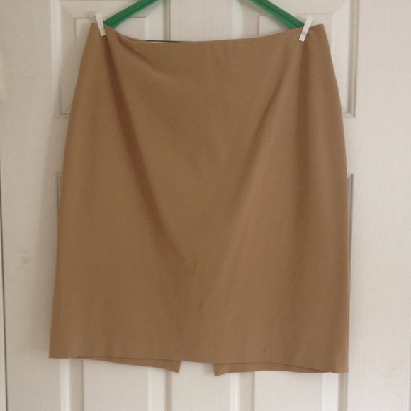 The Limited Stretch Dresses & Skirts - Camel colored skirt. Slit in back.