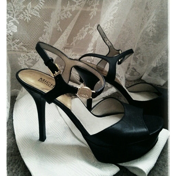 Michael Kors black strappy high heels.