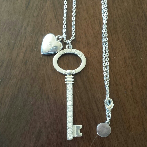 50% off!! Guess Silver heart and key