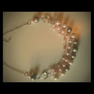 Pearl in silver necklace