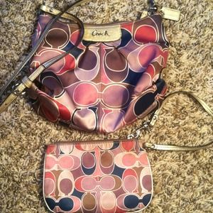 Coach crossbody bag with matching wristlet.