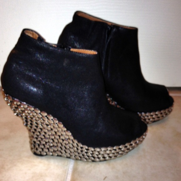 Black leather Jeffrey Campbell wedge bootie.