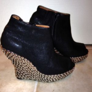 Black leather Jeffrey Campbell wedge bootie.
