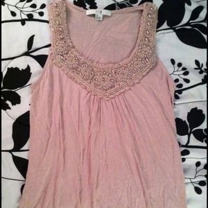 Beaded pastel pink top.