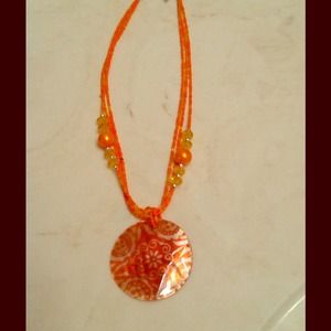 Orange medallion necklace
