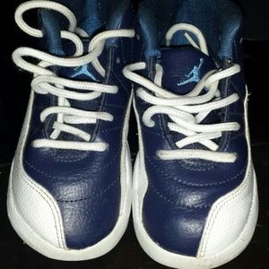 White and navy blue jordan.12s   size 9c