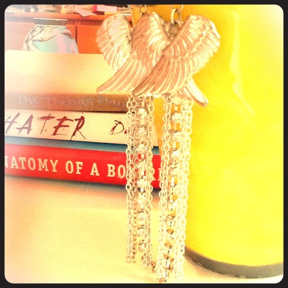 Angel wing earrings.