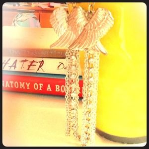 Angel wing earrings.