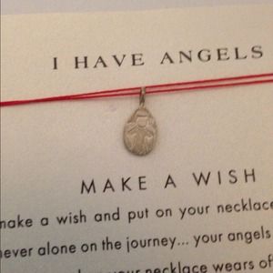 Dogeared Make a Wish angel necklace.