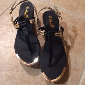 Brand new Gold and Black wedge sandal