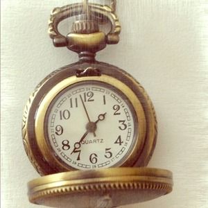 Vintage style locket with pocket watch