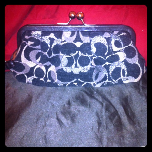 Black sparkly coach clutch