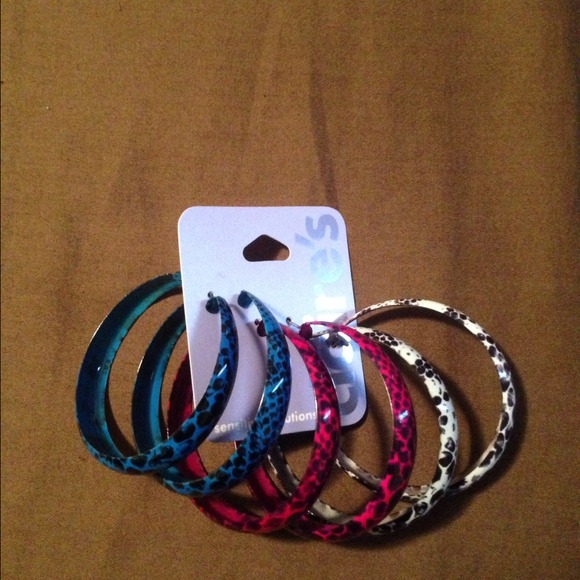 Wild, exotic, animal print earrings. NWT. 3 pairs.