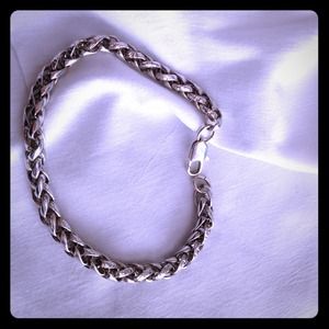 Cute silver toned braided bracelet
