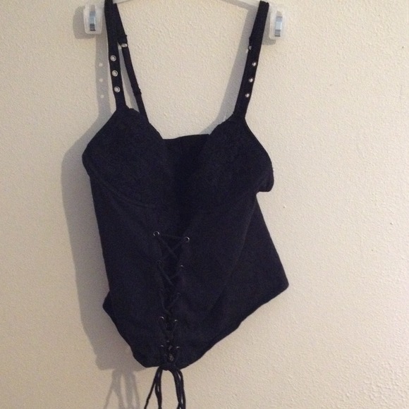 Bundle of corsets, jacket and book