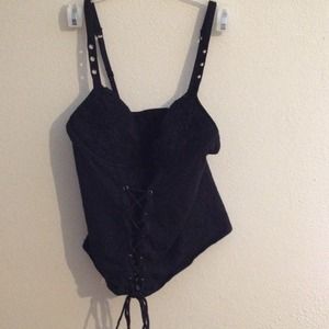 Bundle of corsets, jacket and book