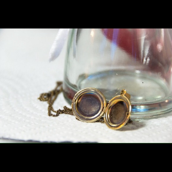 Gold (color) locket necklace
