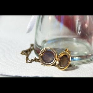 Gold (color) locket necklace