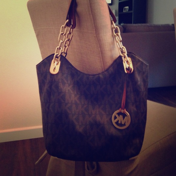 💯% Authentic Signature MK purse