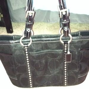 Black and silver coach bag