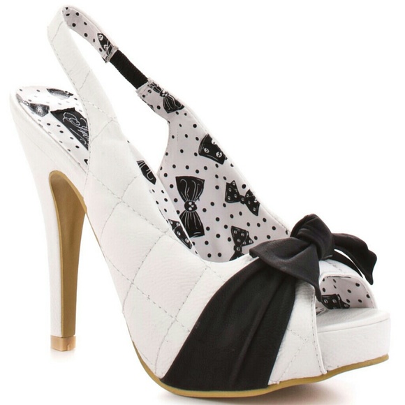 Iron fist strap black and white heels
