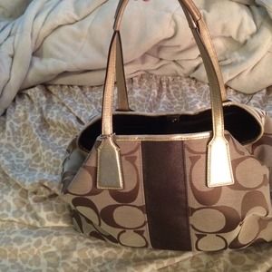 Gold and brown Coach purse