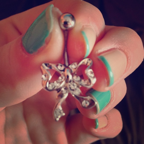 Silver now belly ring