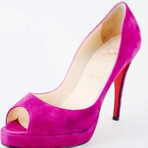 Great condition fuchsia colored Louboutins