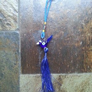 Evil eye bird shape accessory